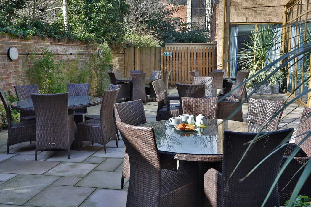 The hotel also has a small outdoor patio, which is a lovely spot for a drink on a sunny day. (Photo: IHG)