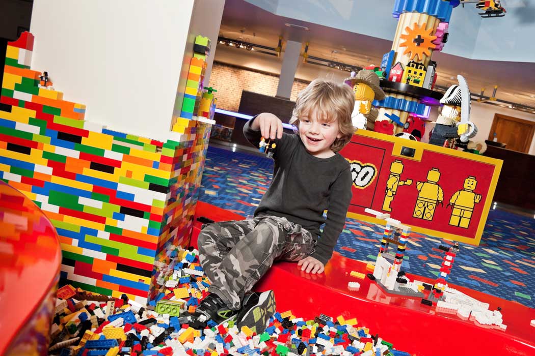 The hotel reception area feels like a children’s play centre with giant Lego models and a Lego play pit. There’s no hiding the fact that you’re staying at Legoland. (Photo © Legoland Windsor Resort)
