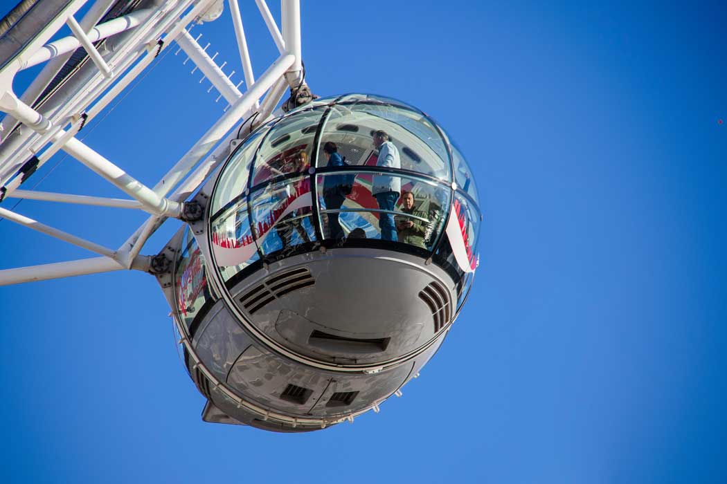 Each pod on the Coca-Cola London Eye holds up to 28 people. Unlike smaller ferris wheels, you are able to stand up and walk around within your pod. (Photo by John Bakator on Unsplash)
