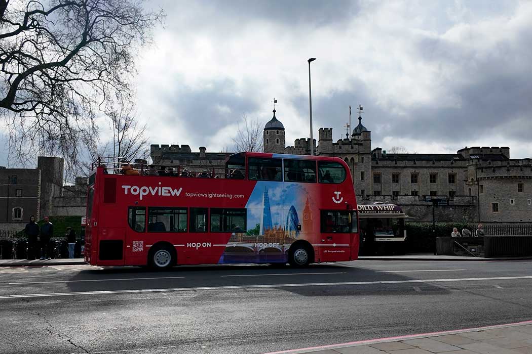 Topview hop-on-hop-off sightseeing bus outside the Tower of London (Photo © 2024 Rover Media)