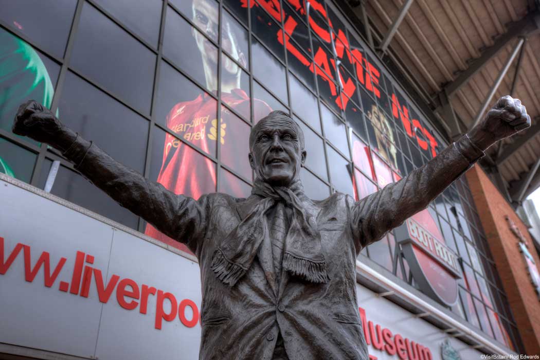 A statue of the most famous player and manager Bill Shankly outside the club shop entrance at Liverpool FC’s Anfield stadium. (Photo © VisitBritain/Rod Edwards).