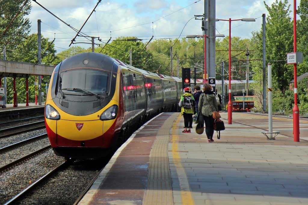 A Virgin train to London arriving at platform four at Lancaster railway station in Lancaster, Lancashire (Photo: Andy Hay [CC BY-SA 2.0])