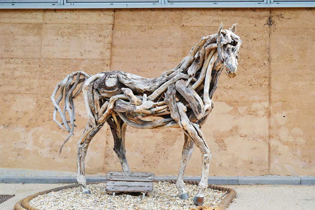 The Eden Project is home to extensive outdoor sculpture including Driftwood by Heather Jansch. (Image by Penstones from Pixabay)