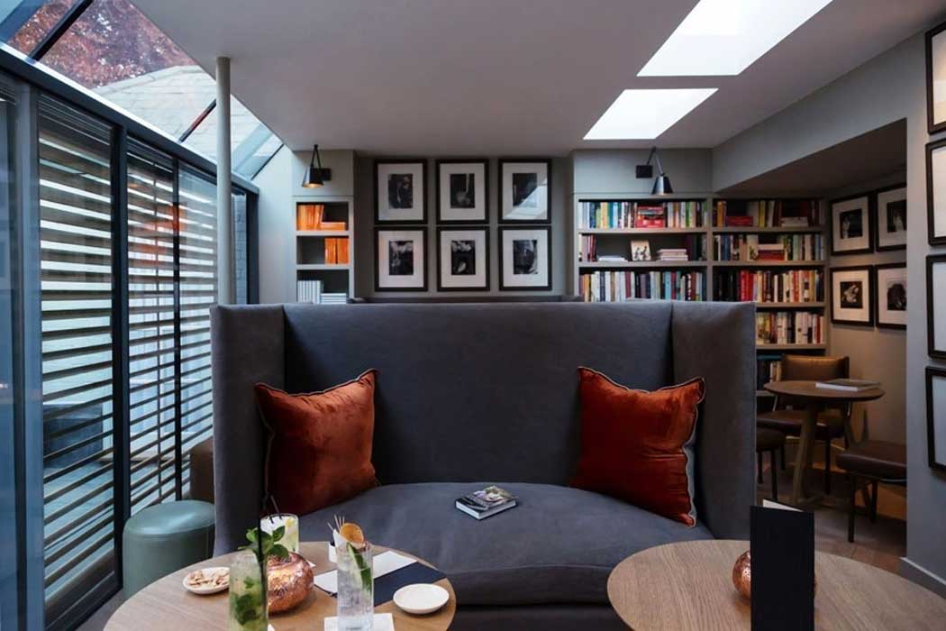 The library at the Old Parsonage Hotel has comfortable sofas and it is a lovely spot to relax with a book on a rainy day.