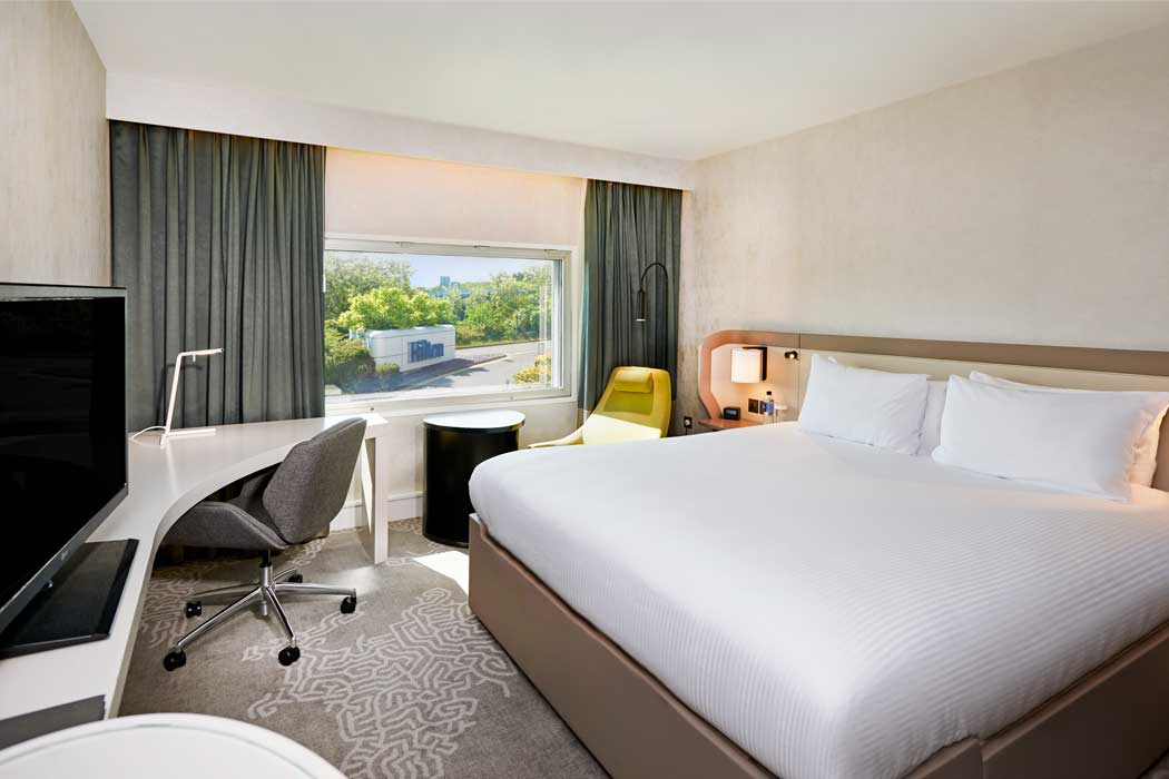 A King Deluxe guest room at the Hilton London Heathrow Airport hotel at Terminal 4 of London Heathrow Airport. (Photo © 2019 Hilton)