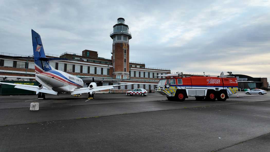 Aviation enthusiasts will enjoy staying at the Crowne Plaza hotel inside Liverpool’s former Art Deco airport terminal. It even features several historic aeroplanes on display on the old airport’s former apron. (Photo © 2024 Rover Media)