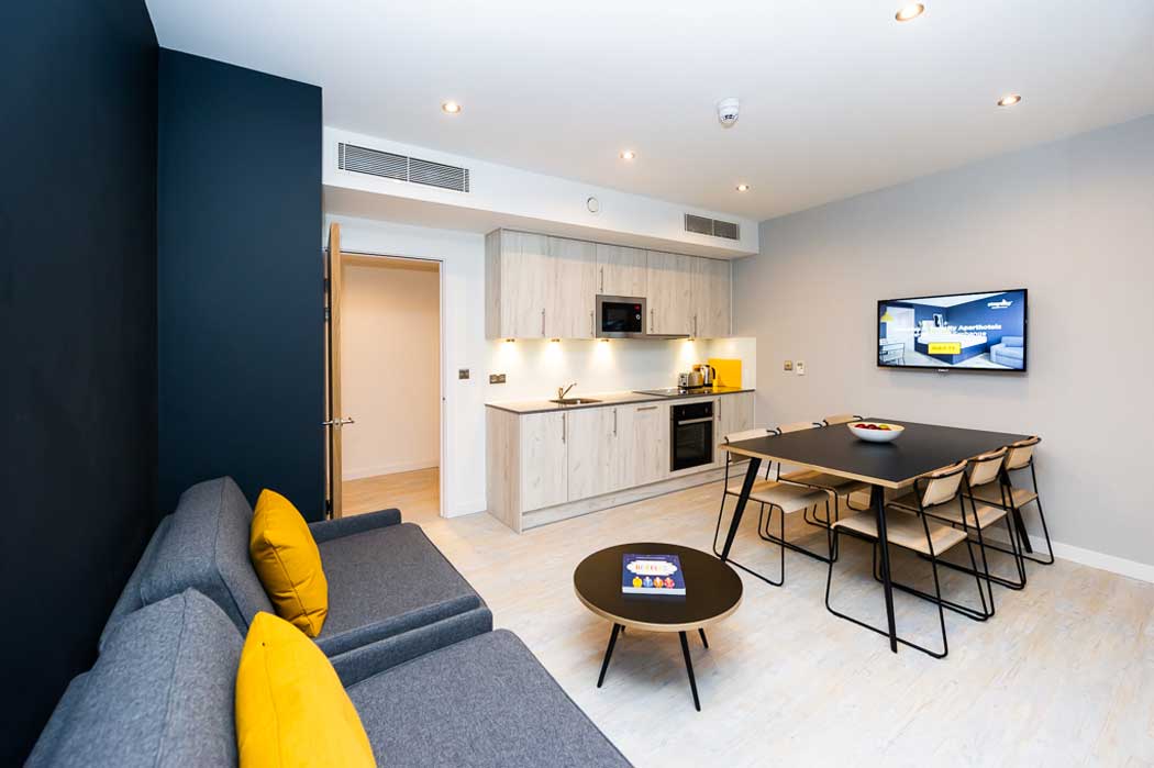 The one- and two-bedroom apartments have separate living and sleeping areas. The living area includes a fully-equipped galley kitchen, a dining area plus a sofa and coffee table. (Photo: Staycity)