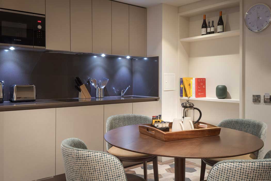 Each suite has its own kitchen and dining table so you can make yourself at home. (Photo: IHG)