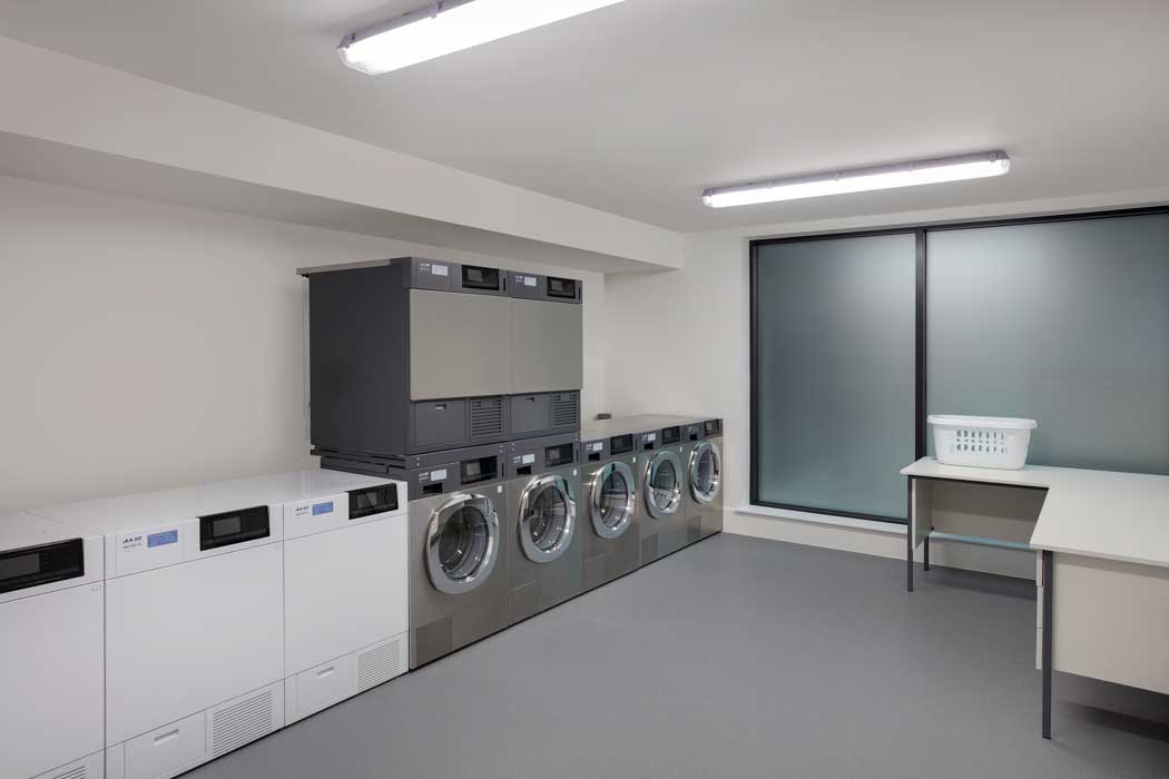 The Staybridge Suites London Heathrow Bath Road is an in-house laundry room that is free for guests to use. (Photo: IHG)