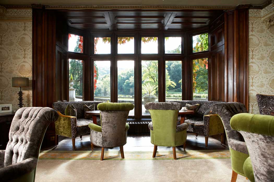 The drawing room is one of several beautiful lounges at the Manor House Hotel in Castle Combe. (Photo © Exclusive Hotels and Venues)