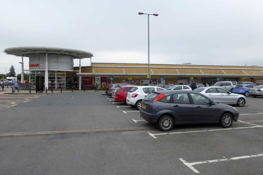 The Megabus coach stop in Swindon is an inconvenient location on the edge of town outside this Sainsbury’s supermarket at Stratton Park near the junction of the A419 and the A420, which is around 4.8km (3 miles) northeast of Swindon town centre. (Photo: David Smith [CC BY-SA 2.0])