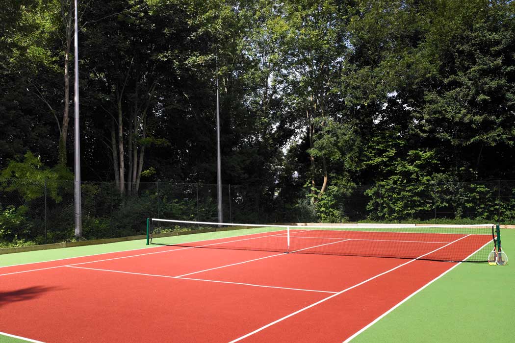 The hotel’s location outside the town centre means that there is more space for extra amenities including a tennis court. (Photo: Marriott)