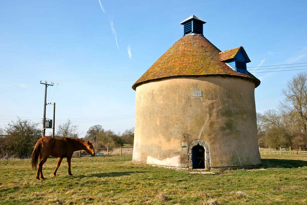 The Kinwarton Dovecote is one of only a handful of circular dovecotes in the United Kingdom. It dates back to the 14th century and it is still home to doves. (Photo: Colin Craig [CC BY-SA 2.0])