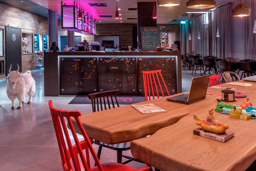The ground floor common space at the Moxy London Excel includes areas for relaxing, socialising and working. (Photo: Marriott)