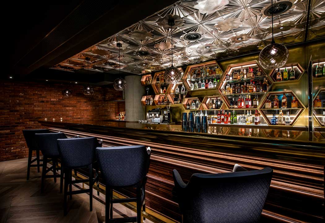 The Jack Speak bar is a more sophisticated spot for a drink. (Photo © 2020 Hilton)