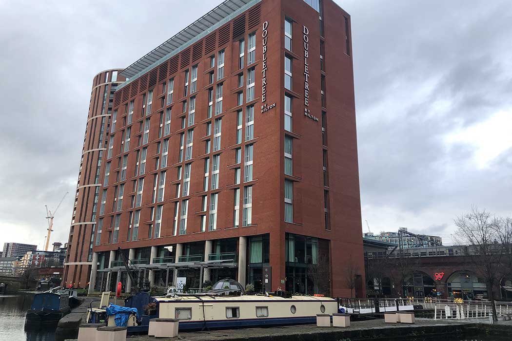 The DoubleTree by Hilton Hotel Leeds City Centre is a popular accommodation option by the waterfront at Granary Wharf, just a one-minute walk from the railway station. (Photo © 2024 Rover Media)