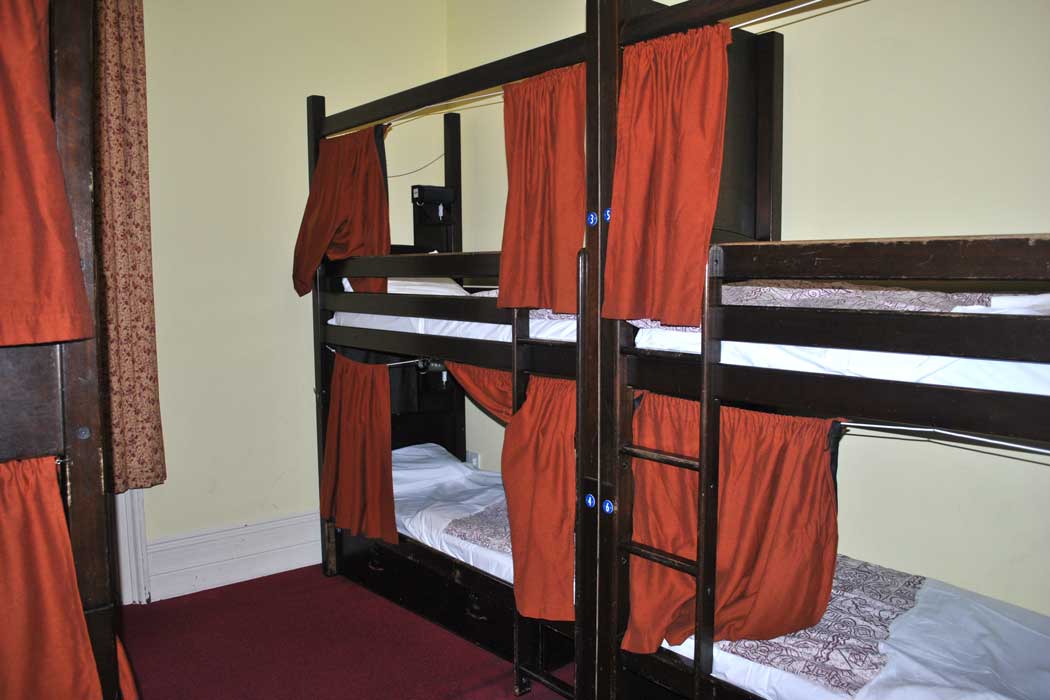 The bunk beds have curtains, which give it a little more privacy than your average dorm bed. 