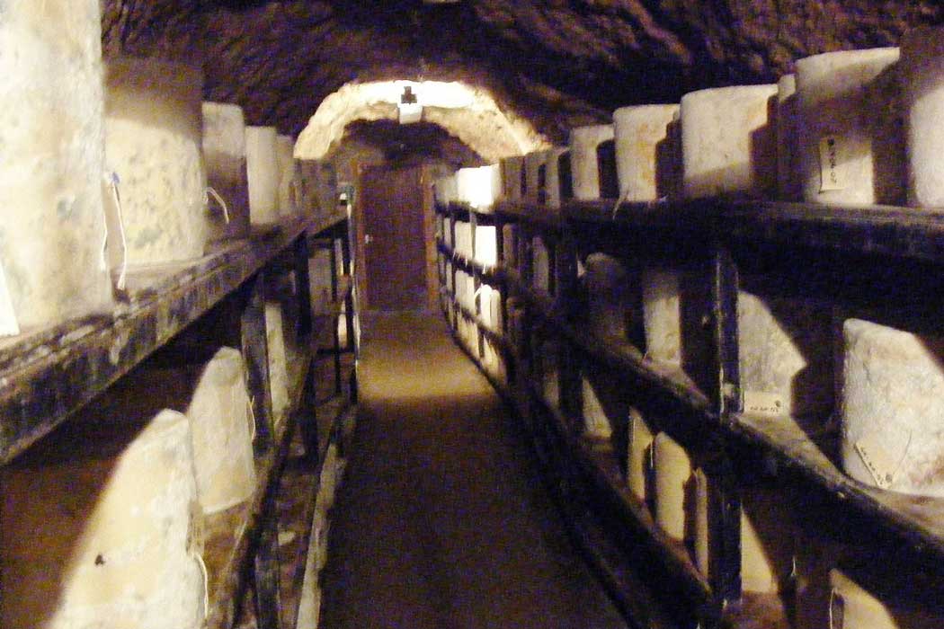 The constant temperature inside the caves means that it is the perfect environment for aging cheddar cheese.