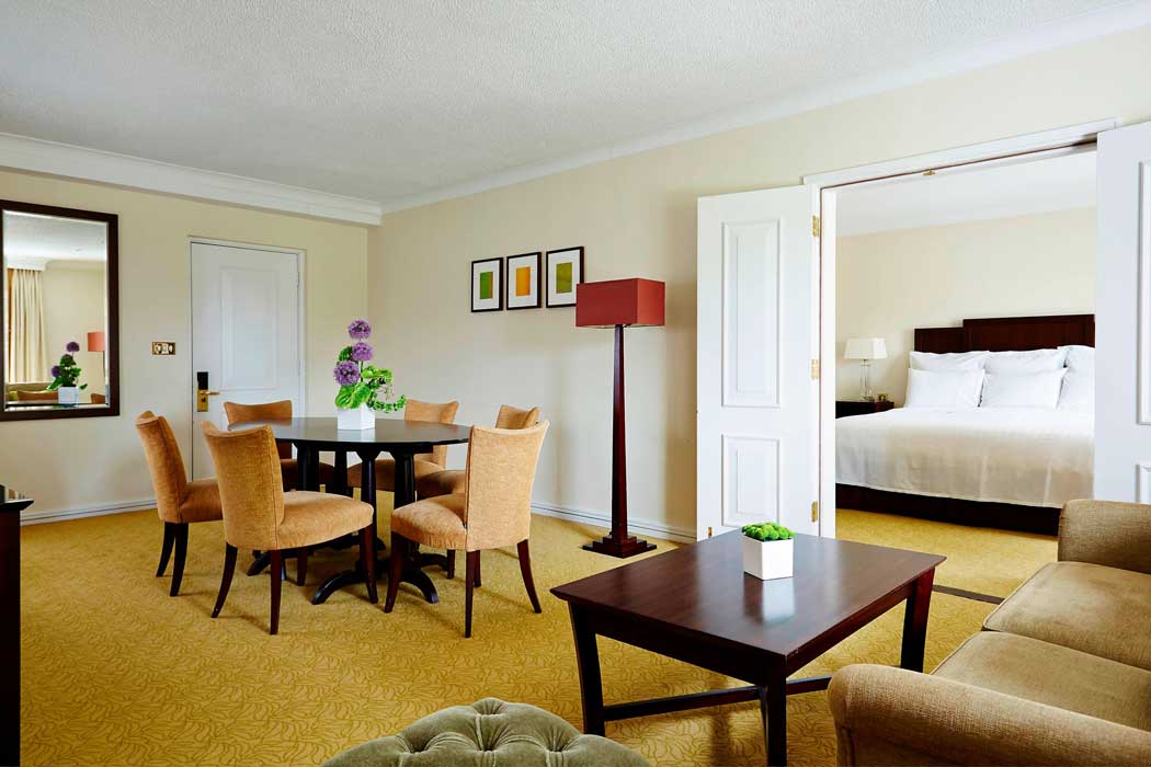 The hotel's one-bedroom suites are larger than standard rooms and feature separate living and sleeping areas. (Photo: Marriott)