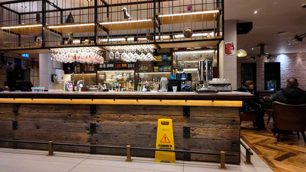 The hotel’s lounge bar is a nice spot to relax with a drink. Breakfast and dinner are served here and guests can also come down here for complimentary tea and coffee. (Photo © 2024 Rover Media)