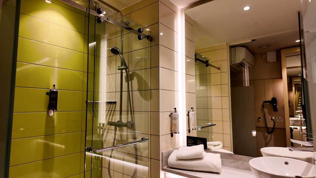 The en suite bathroom has a nice walk-in shower, which is a step up from many Premier Inn hotels that make you step into a bath tub to take a shower. (Photo © 2024 Rover Media)