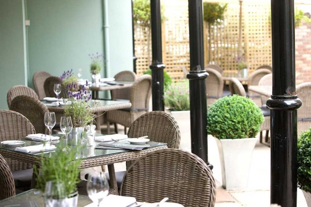 The courtyard is a lovely spot for a drink and a bite to eat on a sunny day. (Photo: Hotel du Vin and Bistro [CC BY-ND 2.0])